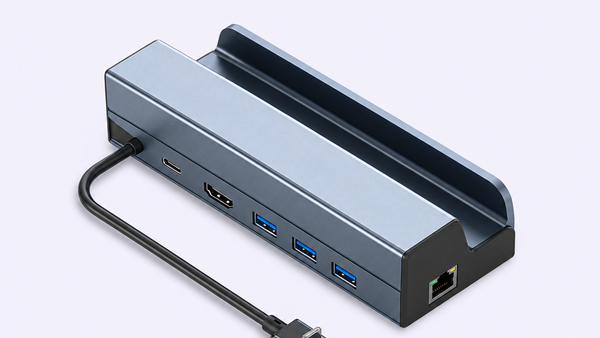 Edited illustration of a handheld dock with its cradle, attached USB-C lead and connection ports